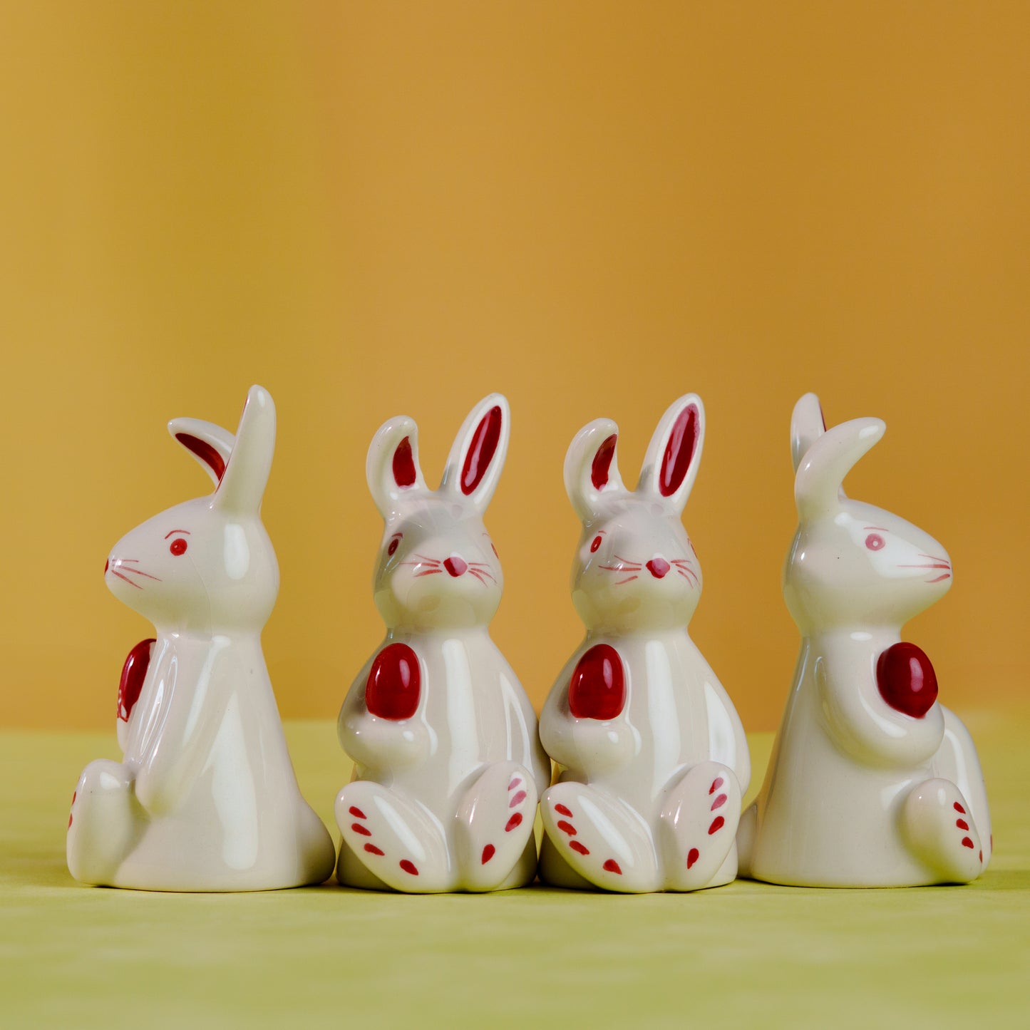 CERAMIC BUNNY WITH EASTER EGG FIGURINE